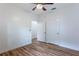 Bright bedroom featuring wood-look floors and double closets at 213 Villa Di Este Ter # 113, Lake Mary, FL 32746