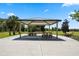 Covered picnic area with tables and benches at 3210 Bayflower Ave, Harmony, FL 34773