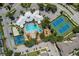 Community features pool, tennis courts, and playground at 2214 Wyndham Palms Way, Kissimmee, FL 34747