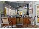 Community outdoor bar with seating and TV at 2214 Wyndham Palms Way, Kissimmee, FL 34747