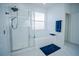 Bathroom with shower, bathtub, and modern tile at 2214 Wyndham Palms Way, Kissimmee, FL 34747