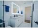 Modern bathroom with white cabinets, granite countertop, and walk-in shower at 2214 Wyndham Palms Way, Kissimmee, FL 34747