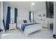 Bright and airy bedroom with a king-size bed, and plenty of storage at 2214 Wyndham Palms Way, Kissimmee, FL 34747