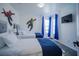 ' bedroom with twin beds, blue accents, and playful superhero wall decals at 2214 Wyndham Palms Way, Kissimmee, FL 34747