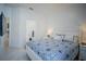 Bright bedroom with a queen-size bed and en-suite bathroom at 2214 Wyndham Palms Way, Kissimmee, FL 34747
