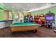 Game room with pool table and racing games at 2214 Wyndham Palms Way, Kissimmee, FL 34747