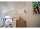 Upstairs hallway with carpet and access to bedrooms at 2214 Wyndham Palms Way, Kissimmee, FL 34747