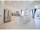 Spacious kitchen with stainless steel appliances and an island at 2214 Wyndham Palms Way, Kissimmee, FL 34747