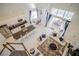 Open concept kitchen with granite countertops and stainless steel appliances at 2214 Wyndham Palms Way, Kissimmee, FL 34747