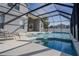 Large pool and spa with screened enclosure at 2214 Wyndham Palms Way, Kissimmee, FL 34747
