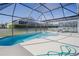 Inviting pool with spa and screened enclosure at 2214 Wyndham Palms Way, Kissimmee, FL 34747