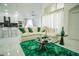 Open living room featuring a comfy sectional sofa and green rug at 8048 King Palm Cir, Kissimmee, FL 34747