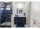 Bathroom with a walk-in shower, built-in vanity, and toilet at 8144 Sun Palm Dr, Kissimmee, FL 34747