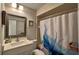 Clean bathroom with white vanity, shower, and updated fixtures at 245 Lake Seminary Cir, Maitland, FL 32751