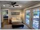 Sunlit sitting room with French doors and view of the backyard at 245 Lake Seminary Cir, Maitland, FL 32751