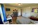 Guest bedroom with a bed, dresser, and desk; ideal for guests or a home office at 245 Lake Seminary Cir, Maitland, FL 32751