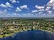 Aerial view showing home's waterfront location and surrounding area at 245 Lake Seminary Cir, Maitland, FL 32751