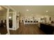 Open concept kitchen with island, white cabinets, and stainless steel appliances at 245 Lake Seminary Cir, Maitland, FL 32751