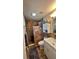 Updated bathroom with a walk-in shower, new vanity, and tile flooring at 245 Lake Seminary Cir, Maitland, FL 32751