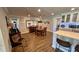Bright dining area with hardwood floors and modern lighting at 245 Lake Seminary Cir, Maitland, FL 32751