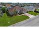 One story house, brown roof, gray siding, and a nicely landscaped yard at 344 Barbera Dr, Davenport, FL 33897