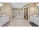 Bathroom with a large soaking tub, shower, toilet and double vanity at 344 Barbera Dr, Davenport, FL 33897