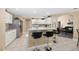 Kitchen with white cabinets, stainless steel appliances, and an island with seating at 344 Barbera Dr, Davenport, FL 33897