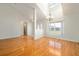 Bright dining room with hardwood floors and vaulted ceiling at 10181 Sw 46 Ct, Ocala, FL 34476