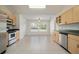 Eat-in kitchen with stainless steel appliances and ample counter space at 10181 Sw 46 Ct, Ocala, FL 34476