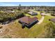 House with a backyard, shed, and a long driveway at 10181 Sw 46 Ct, Ocala, FL 34476