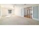 Bright living room features hardwood floors and a view into the dining area at 10181 Sw 46 Ct, Ocala, FL 34476