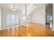 Bright living room with hardwood floors and high ceilings at 10181 Sw 46 Ct, Ocala, FL 34476