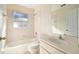 Bathroom with shower/tub combo and vanity at 10181 Sw 46 Ct, Ocala, FL 34476