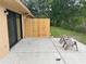 Private patio with seating area and wooden fence at 1915 Sw 34Th Court Ct, Ocala, FL 34474