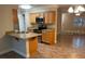 Kitchen with wood cabinets, granite countertop, and appliances at 1915 Sw 34Th Court Ct, Ocala, FL 34474