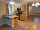 Well-equipped kitchen with ample cabinetry and breakfast bar at 1915 Sw 34Th Court Ct, Ocala, FL 34474