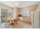 Kitchen with breakfast nook and access to patio at 17846 Se 125Th Cir, Summerfield, FL 34491