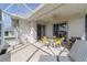 Spacious screened patio with seating and backyard views at 17846 Se 125Th Cir, Summerfield, FL 34491