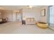 Living area with a neutral color scheme and comfortable seating at 17846 Se 125Th Cir, Summerfield, FL 34491