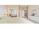 Main bedroom with king size bed, dresser, and mirrored closet doors at 17846 Se 125Th Cir, Summerfield, FL 34491
