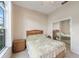 Bedroom with mirrored closet doors and a double bed at 17846 Se 125Th Cir, Summerfield, FL 34491