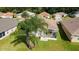 Aerial view of house showcasing backyard lanai and surrounding neighborhood at 17846 Se 125Th Cir, Summerfield, FL 34491