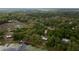 Aerial view showing a house near the lake with a dock at 22649, 22645 And Tbd Ne 105Th Avenue Rd, Fort Mc Coy, FL 32134