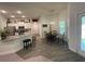 Open kitchen with granite countertops and stainless steel appliances at 7830 Sw 103Rd Loop, Ocala, FL 34476