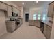Modern kitchen featuring stainless steel appliances and granite countertops at 7830 Sw 103Rd Loop, Ocala, FL 34476