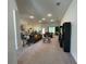 Open living room with ample space for relaxing and entertaining at 7830 Sw 103Rd Loop, Ocala, FL 34476