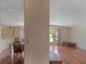 Open living room and kitchen area at 1618 Cypress Pt, Lady Lake, FL 32159