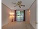 Spacious bedroom with sliding glass doors leading to a patio at 1618 Cypress Pt, Lady Lake, FL 32159