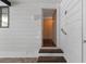 Steps leading to an interior hallway at 1618 Cypress Pt, Lady Lake, FL 32159