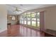 Living room with hardwood floors and large windows at 1618 Cypress Pt, Lady Lake, FL 32159